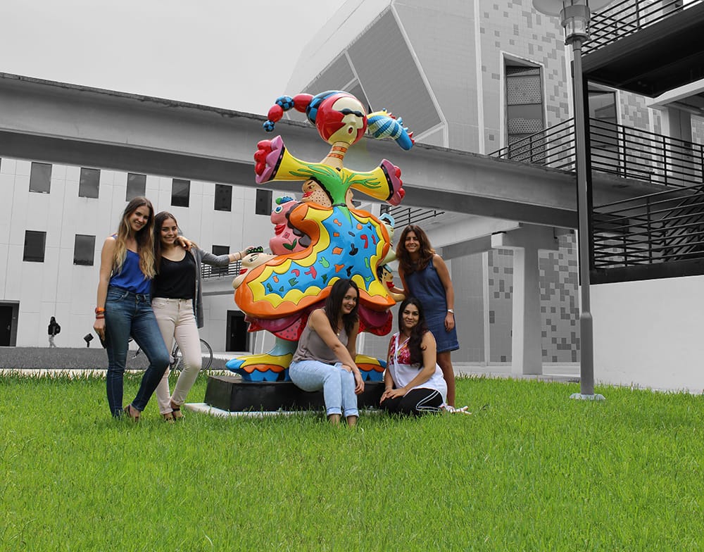 Students and alumni crown around Whoopee, a sculpture