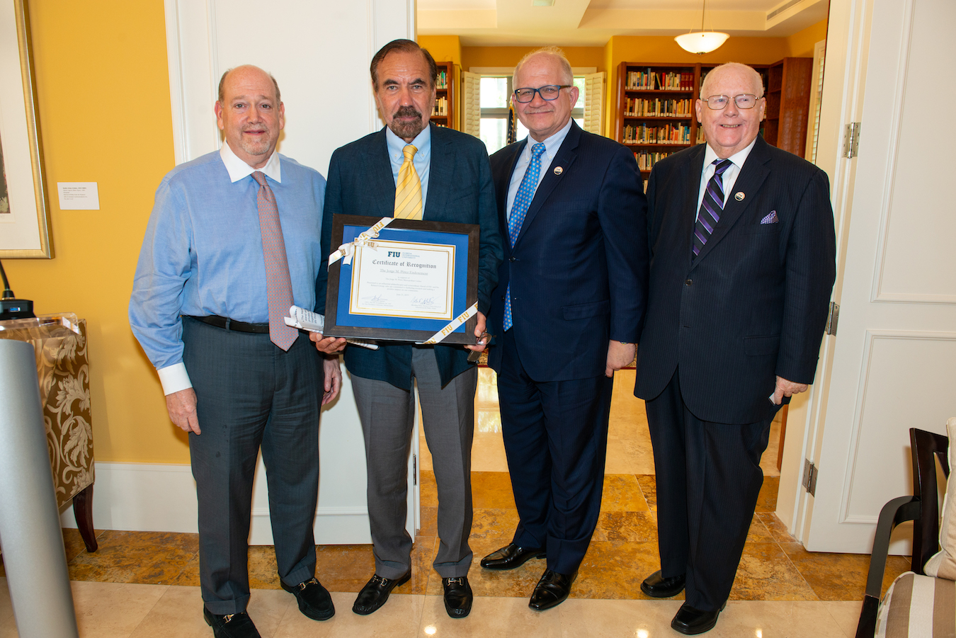 Howard R. Lipman, CEO, FIU Foundation, Inc.; Jorge M. Pérez; President Mark B. Rosenberg; John F. Stack Jr., Dean, Steven J. Green School of International & Public Affairs